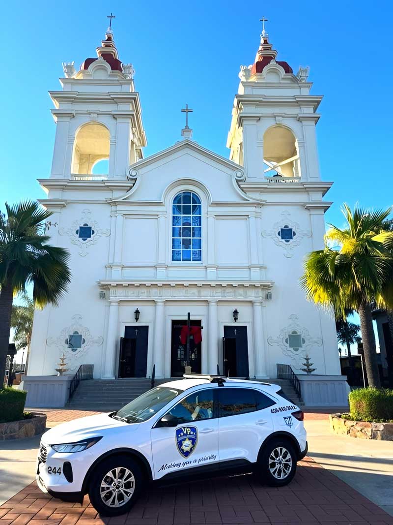 Security services vehicle parked near a church in San Jose, CA